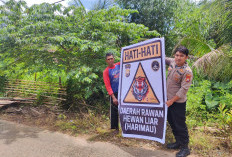 Polsek Muara Sahung Pasang Spanduk Peringatan Harimau