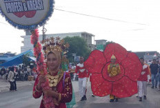 Satria Naga Kuning Tampilkan Replika Naga dan Bunga Raflesia