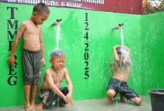 Senyum Ceria Anak-anak Sambut Sumur Bor Program TMMD Di Desa Bandu Agung