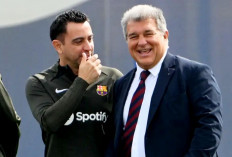 Dinginnya Xavi dan Laporta